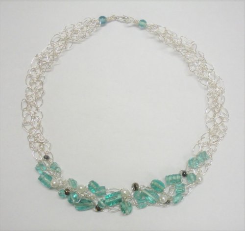 Judy Larson's Wire Crocheted Necklace - , Contemporary Wire Jewelry, Crocheting, Clasp the necklace and curve it into a flat round